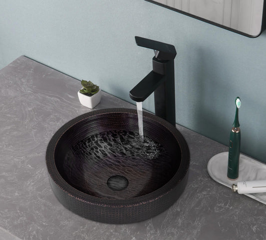 Fregadero redondo de cobre con delantal 